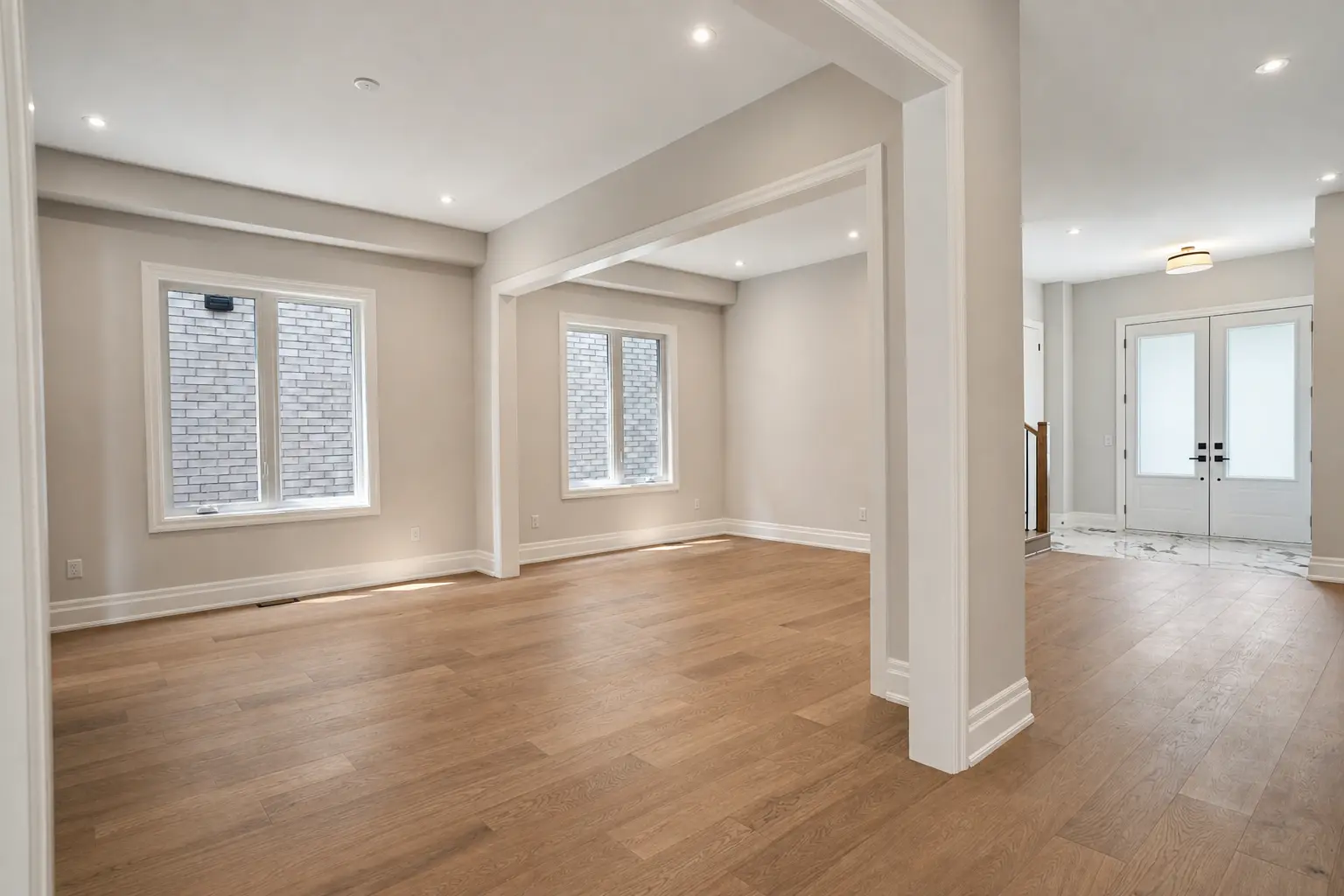 Front sitting rooms opening to the double-door entry